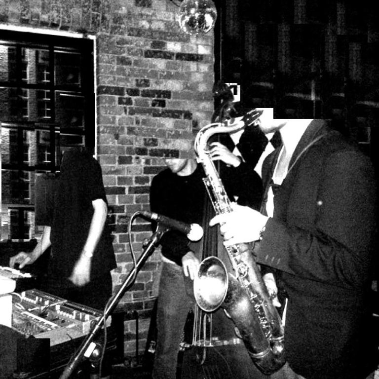 Thinkeries Potbelt at Kaiku Abstract Photo in black and white with the three musicians without head